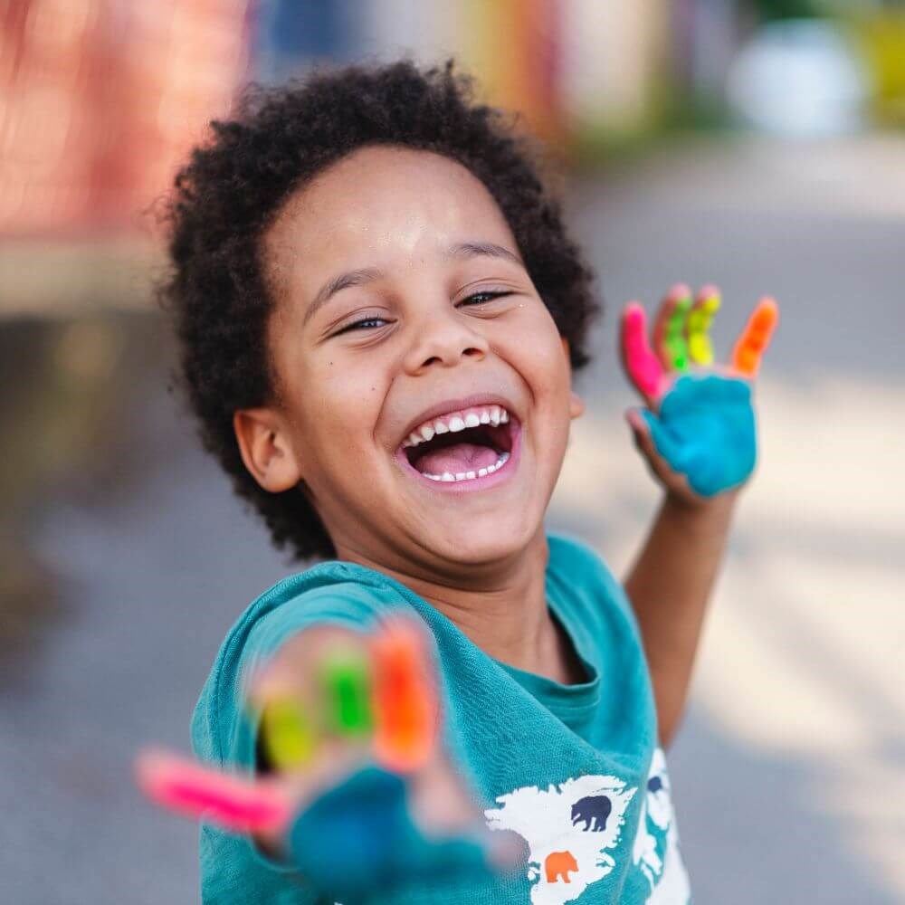 Kid Playing while smiling